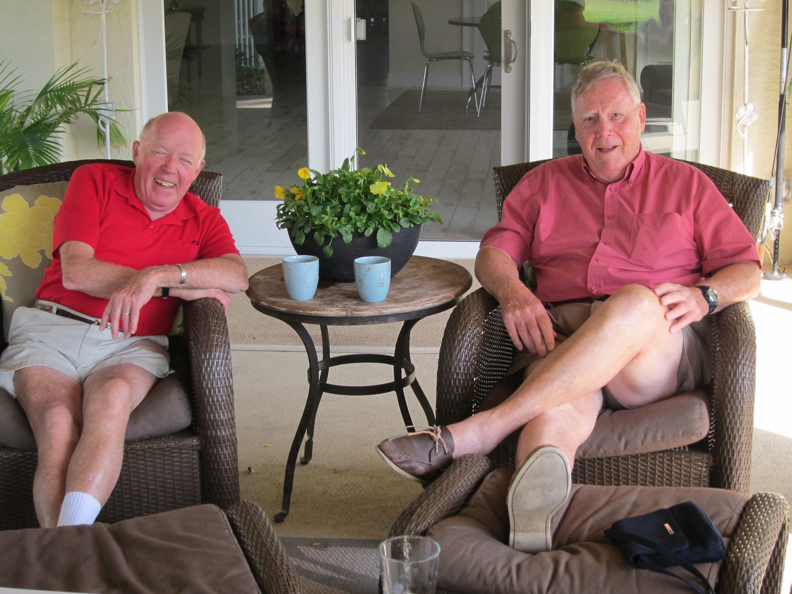 Peter enjoying some time with John Dew, the bride groom at Tiffany's house.
